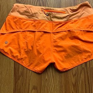 Orange speed ups lululemon size 4